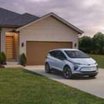 2023 Chevrolet Bolt EV backed-in on a residential driveway