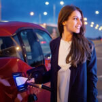 Millennials love driving electric. Arm yourself with information about the competing charging standards before you buy. Photo credit: praetorianphoto via iStock.