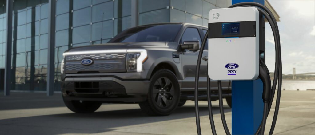 A Ford F-150 Lightning at a Ford Pro charging point.