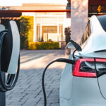 A Tesla charging. (Source: Tesla) Federal EV Charging Points To Be Shut Down